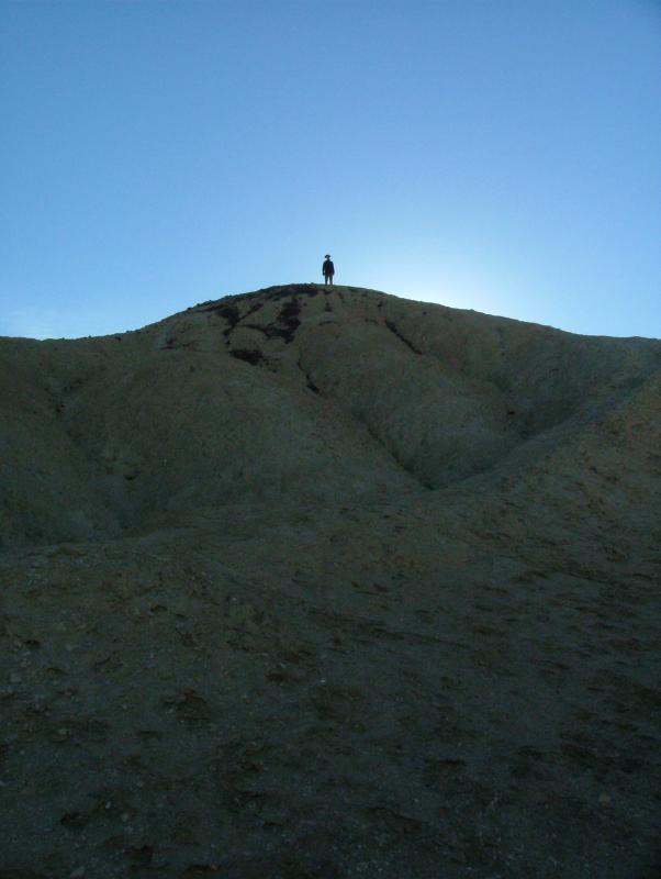 Rob at the top of a tall mound, Twenty Mule Canyon, Death Valley National Park
