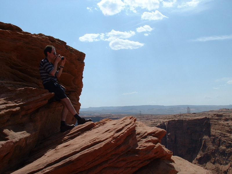 Rob taking a photo of Glen Canyon Dam and Lake Powel, Arizona
